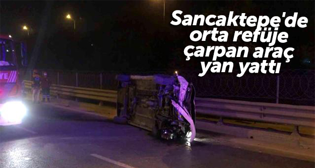 Sancaktepe'de orta refüje çarpan araç yan yattı